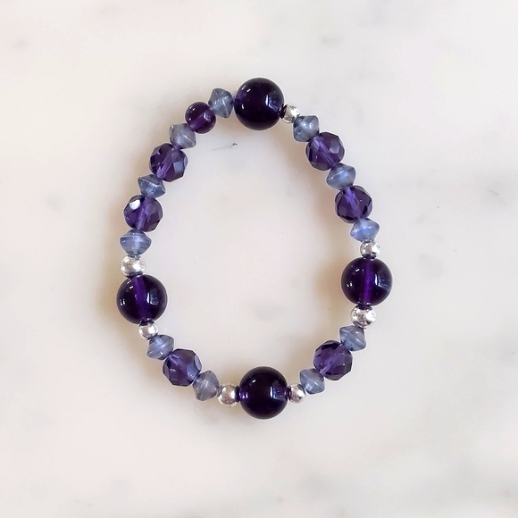 NWOT. The Limited Multi Shades of Purple/Shapes w/Chrome Beads Stretch Bracelet. - Picture 2 of 2